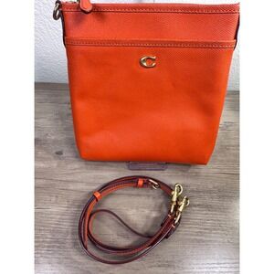 Coach Orange Pebble Leather Crossbody Bag With Front Pocket‎